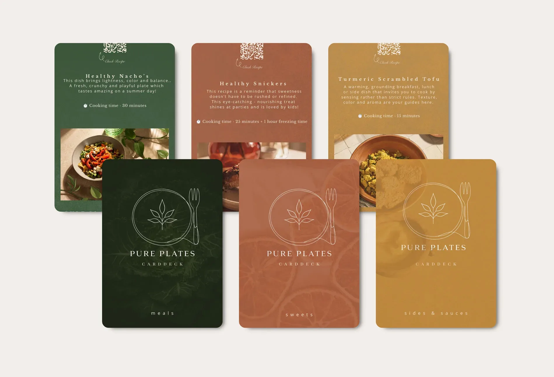 Cards from the Pure Plates Card Deck in green, terracotta and mustard