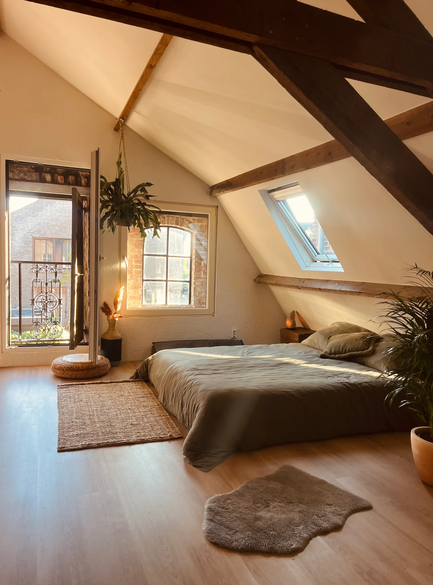 A bedroom with a skylight